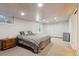 Basement bedroom with carpet, a bed, recessed lights, and a closet with sliding doors at 9532 W Walden Ave, Littleton, CO 80128