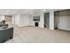 Spacious basement with carpet, recessed lighting, television, and comfortable seating area at 9532 W Walden Ave, Littleton, CO 80128