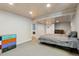 Finished basement area with recessed lighting, carpet, and potential for bedroom and/or recreation area at 9532 W Walden Ave, Littleton, CO 80128
