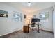 Bright home office with natural light, desk, and neutral colors at 9580 W 12Th Pl, Lakewood, CO 80215