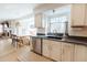 Updated kitchen featuring granite countertops, stainless steel appliances, and a sink with a view at 6512 S Taft Way, Littleton, CO 80127