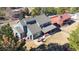 Aerial view of home with large back deck, outdoor seating and spacious yard at 6526 N Windfield Ave, Parker, CO 80134