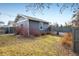 Backyard with grass and a fence at 722 Hutchinson St, Louisville, CO 80027