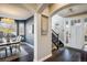 Elegant dining room featuring stylish lighting, hardwood floors, and many windows at 722 Hutchinson St, Louisville, CO 80027