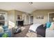 Spacious main bedroom featuring a sitting area, walk-in closet, and ensuite bath at 722 Hutchinson St, Louisville, CO 80027