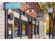 Boutique shops with brick and light-colored siding, featuring large display windows at 722 Hutchinson St, Louisville, CO 80027