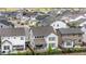 Aerial backyard view of this property, surrounded by a well-maintained community at 9140 Moondance Dr, Littleton, CO 80125
