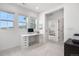Bright, minimalist bedroom with a home office, and access to the Bedroom at 9140 Moondance Dr, Littleton, CO 80125