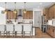 Modern kitchen featuring stainless steel appliances, quartz countertops, and ample cabinet space at 9140 Moondance Dr, Littleton, CO 80125