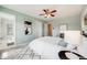 Bright bedroom with a ceiling fan, closet and a desk area at 2820 Macon Way, Denver, CO 80238
