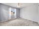 Bedroom with neutral paint, a ceiling fan and a bright window at 2820 Macon Way, Denver, CO 80238