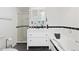 Stylish bathroom features a vanity, soaking tub, and a glass-enclosed shower at 6906 S Sycamore St, Littleton, CO 80120