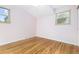 Bright, unfurnished bedroom with hardwood floors and natural light at 6906 S Sycamore St, Littleton, CO 80120