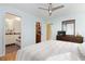 Bedroom features an en-suite bathroom and walk-in closet at 6906 S Sycamore St, Littleton, CO 80120