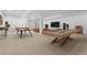 Spacious basement with pool table, seating area, and ample room for entertaining at 7882 Vallagio Ln, Englewood, CO 80112