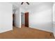 Spacious bedroom with neutral walls and carpet at 7882 Vallagio Ln, Englewood, CO 80112