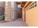 Inviting entryway with a double door and a stone facade at 7882 Vallagio Ln, Englewood, CO 80112
