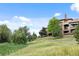 Stately house with stone accents located next to green space at 7882 Vallagio Ln, Englewood, CO 80112