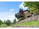 Upscale home sits behind an impressive stone wall, backing to a golf course at 7882 Vallagio Ln, Englewood, CO 80112