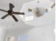 High-ceiling room with skylights and ceiling fan at 7882 Vallagio Ln, Englewood, CO 80112