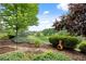 Manicured landscaping offers golf course views from this property at 7882 Vallagio Ln, Englewood, CO 80112