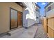 Backyard featuring a sliding glass door providing easy access to the home's interior at 1727 Lowell Blvd, Denver, CO 80204
