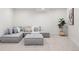 Finished basement with plush seating, neutral tones, and modern decor at 1727 Lowell Blvd, Denver, CO 80204