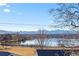 Beautiful lake view featuring mountains, a walking path, and natural beauty at 1727 Lowell Blvd, Denver, CO 80204