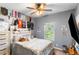 Bedroom with decor and a window overlooking the outdoor scenery at 11044 Conestoga Pl, Franktown, CO 80116