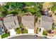 Stunning aerial view highlights the property's prime location, mature landscaping, and well-manicured surroundings at 1997 Fox Haven Dr, Castle Rock, CO 80104