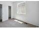 Bedroom featuring plush carpeting, closet, and a window with lots of natural light at 1224 Penner Dr, Erie, CO 80026