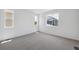 Bright bedroom featuring plush carpeting and windows offering lots of natural light at 1224 Penner Dr, Erie, CO 80026