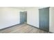 Comfortable bedroom featuring modern closet doors and fresh paint at 7810 Larkwood St, Commerce City, CO 80022