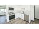 Well-equipped kitchen boasting stainless steel appliances and a stylish backsplash at 7810 Larkwood St, Commerce City, CO 80022