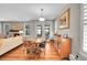 Bright dining area with hardwood floors, perfect for Gathering meals and gatherings at 6670 Club Villa Rd, Parker, CO 80134