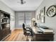 Well-organized office with a desk, comfortable chair, and ample storage at 6670 Club Villa Rd, Parker, CO 80134