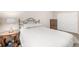 Comfortable bedroom featuring a full bed with neutral walls, carpet, and closet at 19407 E Radcliff Pl, Aurora, CO 80015