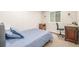 Bedroom featuring carpet, neutral walls, a window and a comfortable full bed at 19407 E Radcliff Pl, Aurora, CO 80015