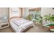 Cozy bedroom filled with plants next to the window at 19407 E Radcliff Pl, Aurora, CO 80015