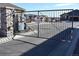 Community security gate showing controlled access for residents and monitored by camera at 19407 E Radcliff Pl, Aurora, CO 80015