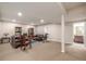 Spacious living room with leather furniture and lots of light at 19407 E Radcliff Pl, Aurora, CO 80015