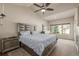 Spacious main bedroom with vaulted ceilings, large window, and lots of natural light at 19407 E Radcliff Pl, Aurora, CO 80015