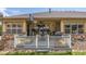 The outdoor patio features a dining set, grill, and basketball hoop for entertainment at 19407 E Radcliff Pl, Aurora, CO 80015
