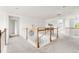 Upstairs hallway featuring carpeting, white walls, and natural lighting at 12032 Triple Crown Dr, Parker, CO 80134