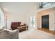 Open living area with high ceilings, wood floors, and a staircase to the second floor at 10707 W Cooper Dr, Littleton, CO 80127