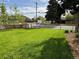 Spacious backyard with a large grassy area at 4790 E Dartmouth Ave, Denver, CO 80222