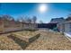 Landscaped backyard with raised garden beds at 4790 E Dartmouth Ave, Denver, CO 80222