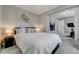 Cozy bedroom with neutral decor and ample natural light at 4790 E Dartmouth Ave, Denver, CO 80222