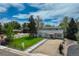 Stunning home with landscaped front yard, modern walkway, and charming fence offering curb appeal at 4790 E Dartmouth Ave, Denver, CO 80222