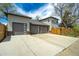 Spacious three-car garage with ample parking space and modern design at 4790 E Dartmouth Ave, Denver, CO 80222